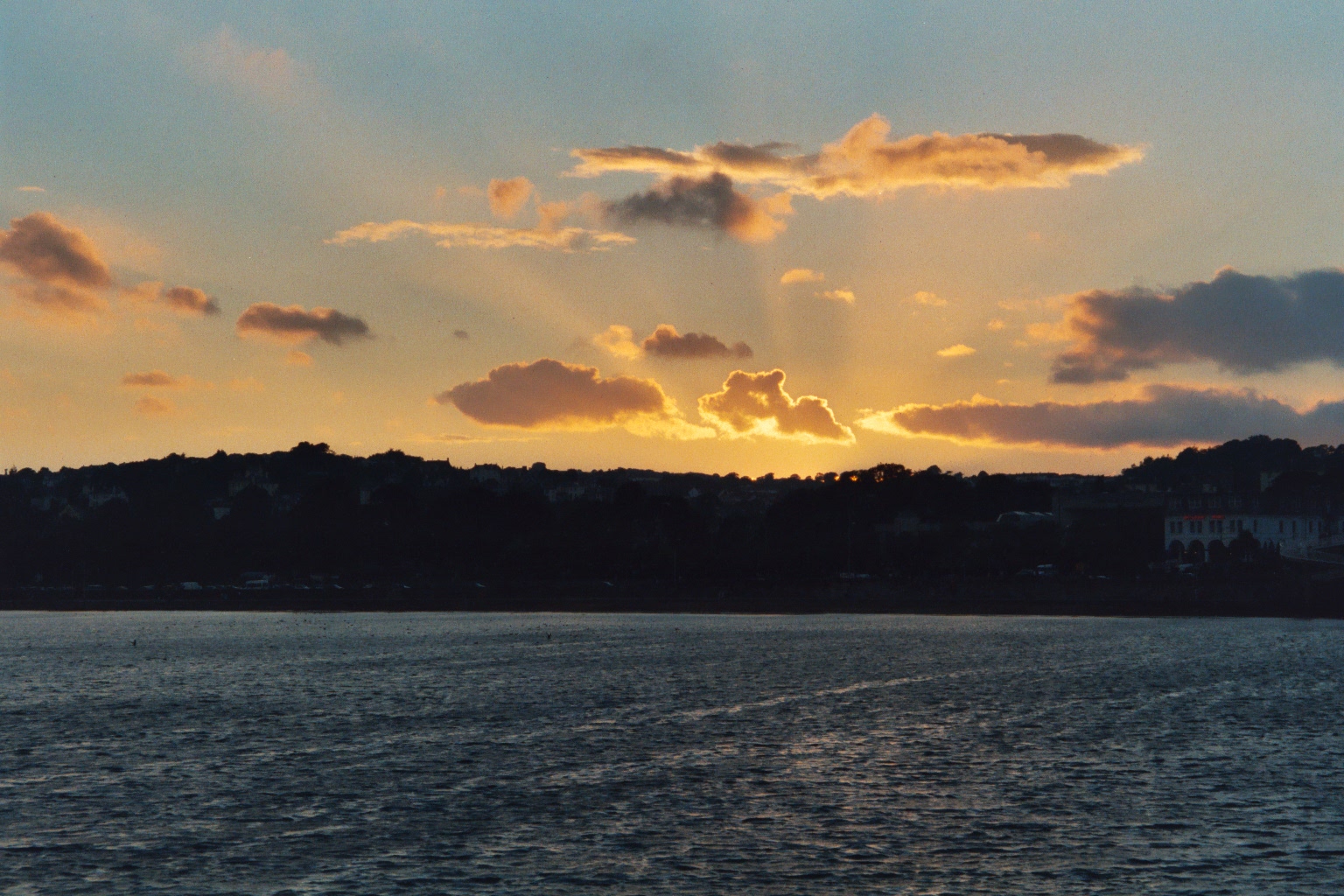 sunset over Torquay from The English Channel